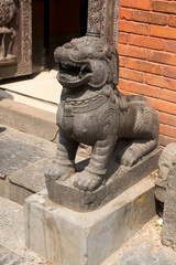 Guard in the entrance in Swayambhunath religious complex aka Monkey Temple - ancient religious complex, on the west of Kathmandu city.
