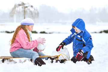 Happy family enjoying in winter