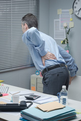 Tired business with back pain