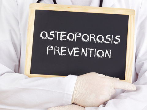 Doctor shows information: osteoporosis prevention