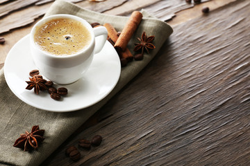 Cup of coffee on wooden table