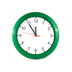 Twelve o'clock on wall watch isolated