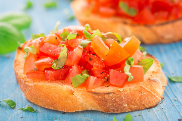 Italian tomato bruschetta with basil