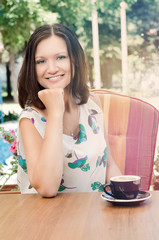 Attractive woman drinking coffee