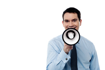 Man with a megaphone isolated on white