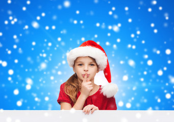 smiling little girl in santa helper hat