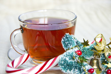 Knitted wool texture xmas decoration, candy cane or cup of tea