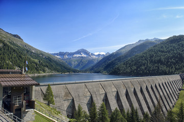 Obraz na płótnie Canvas Landscape mountains Lake Dam in Italy Trentino Dolomites Alps