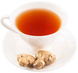 Ginger root and a cup of tea over white background