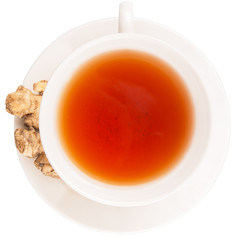 Ginger root and a cup of tea over white background