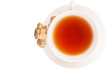 Ginger root and a cup of tea over white background