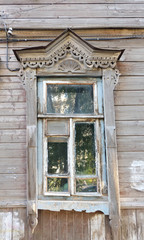 Old window in Astrakhan. Ancient Russian architecture sample.