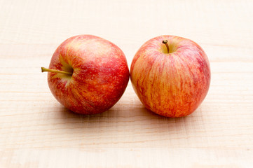 Apples on wooden background