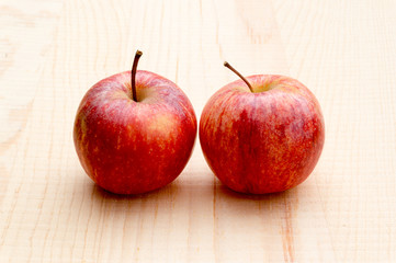 Apples on wooden background