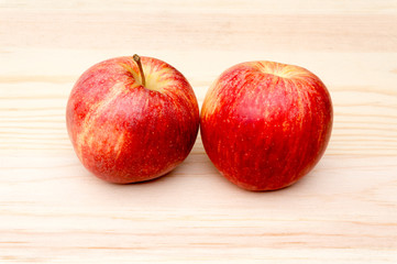Apples on wooden background