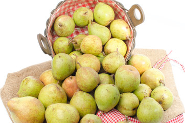 Pears in a basket and on burlap