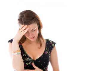 model isolated on plain background ashamed hiding face in hand