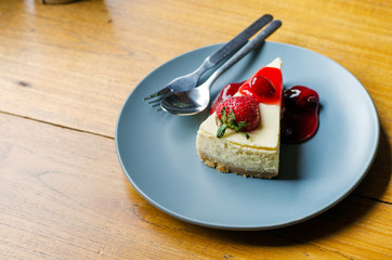 Strawberry Cheesecake on wooden table