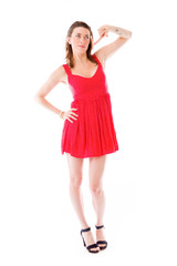 model isolated on plain background pointing to herself