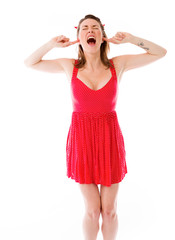 model isolated on plain background plugging ears with fingers