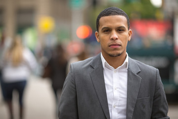 Young African American black Latino man serious face
