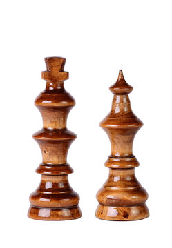 Wooden chess king and queen isolated on white