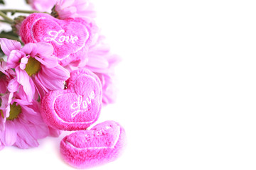 Obraz na płótnie Canvas valentine heart fabric with pink chrysanthemum- Stock Image