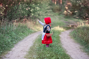 Little Red Riding Hood in the woods