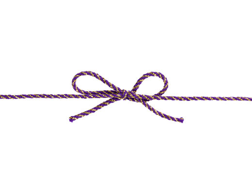 string tied in a bow isolated on white background