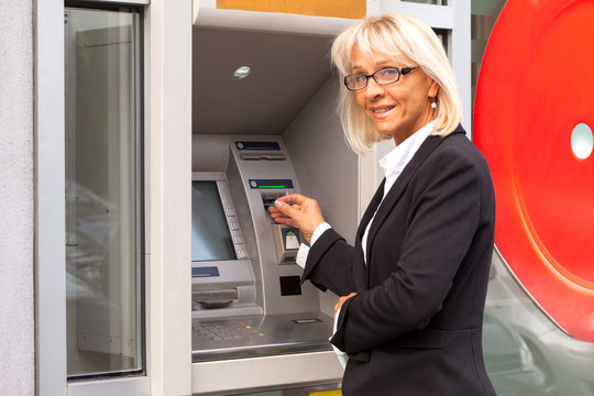 Bussines Woman Taking Money From ATM