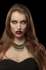 Fototapeta premium Portrait of a gothic vampire woman