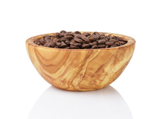 Fototapeta na wymiar roasted coffee beans in olive wood bowl