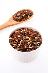 Obraz premium Rice brown isolated on white background