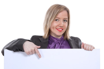 Businesswoman pointing and showing blank banner