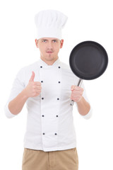 young handsome man chef in uniform with teflon frying pan thumbs