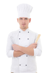 young man chef  holding kitchen equipment isolated on white