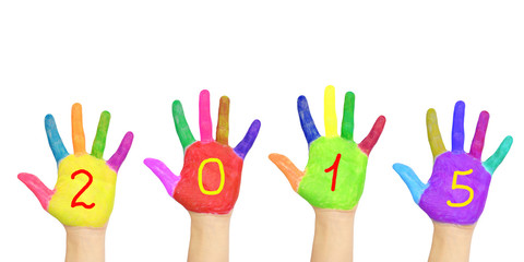 Kid`s colorful hands forming number 2015.