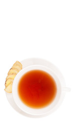 Ginger slices and a cup of tea over white background