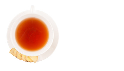 Ginger slices and a cup of tea over white background