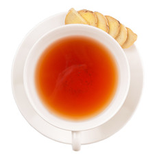 Ginger slices and a cup of tea over white background