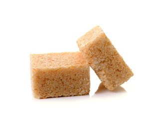 Cubes of cane sugar isolated on white background