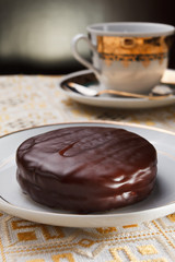 Homemade delicious pastry covered with dark chocolate