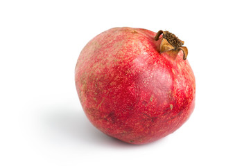 Natural pomegranate isolated on white
