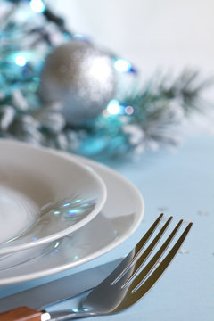 Christmas table with cutlery and tableware abstract background