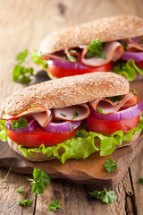 healthy sandwich with ham tomato and lettuce