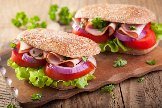 healthy sandwich with ham tomato and lettuce
