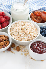 oat flakes and breakfast ingredients, vertical
