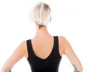 Fototapeta premium model isolated on plain background back hands on hips