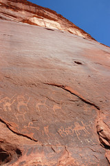 Fototapeta na wymiar Ancient petroglyph drawings in Wadi Rum, Jordan.