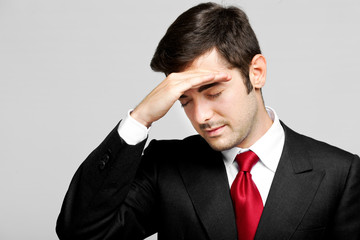 Portrait of a worried and stressed businessman